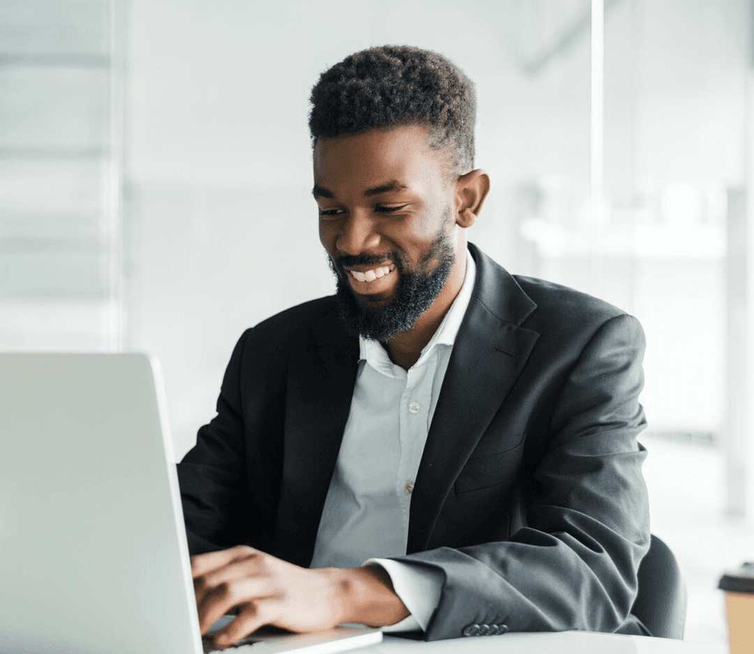 A happy young man working